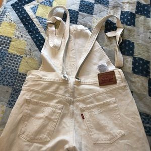 White Levis overalls